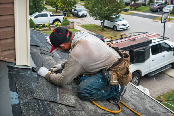 Professional Roofing technician working in Round Mountain, CA